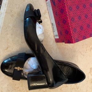 Tory Burch Patent leather black heels.
